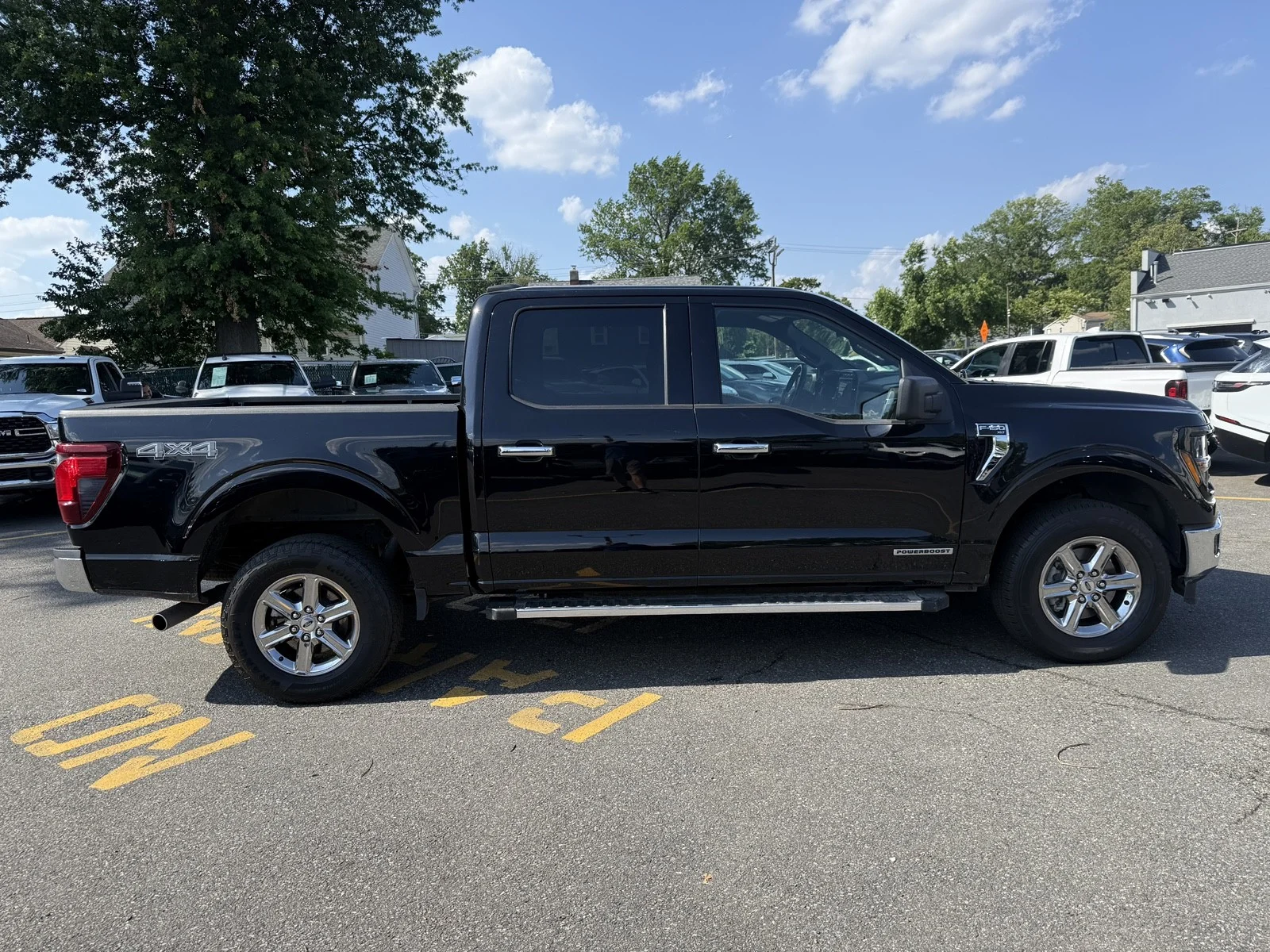 Used 2024 Agate Black Metallic Ford XLT 4WD image 6