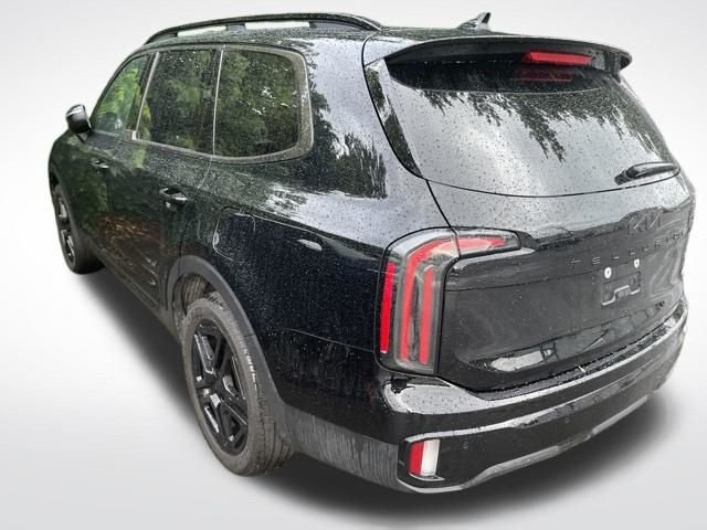 Used 2025 Ebony Black Kia EX X-Line image 7