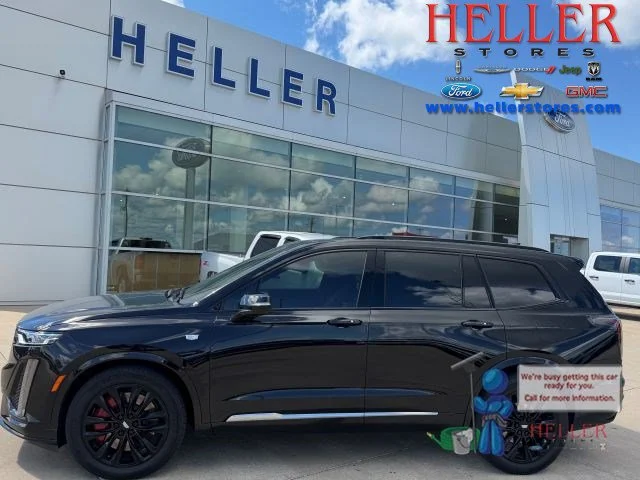 Used 2023 Stellar Black Metallic Cadillac Sport image 1