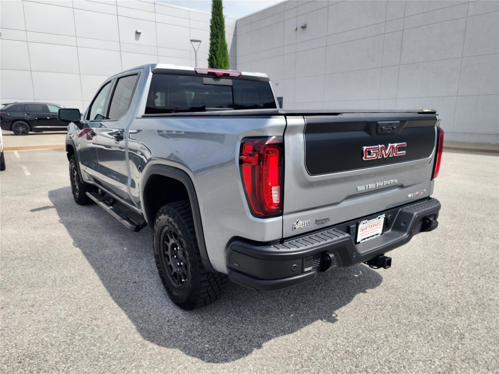 Used 2024 Sterling Metallic GMC AT4X image 4