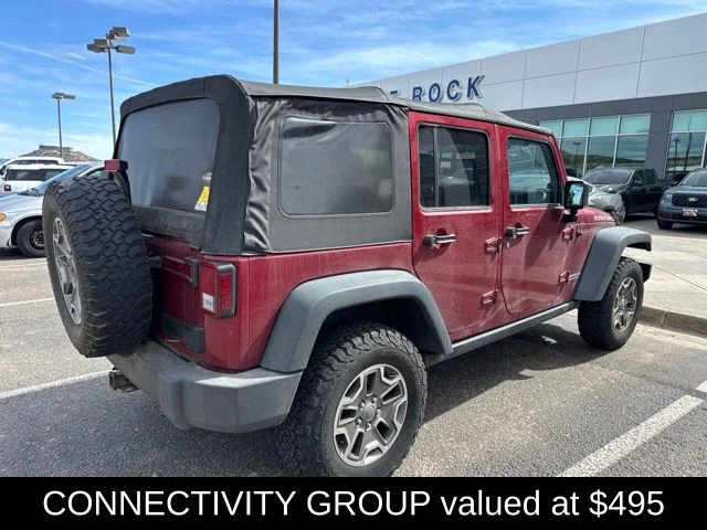 Used 2013 Red Jeep Unlimited Rubicon image 4