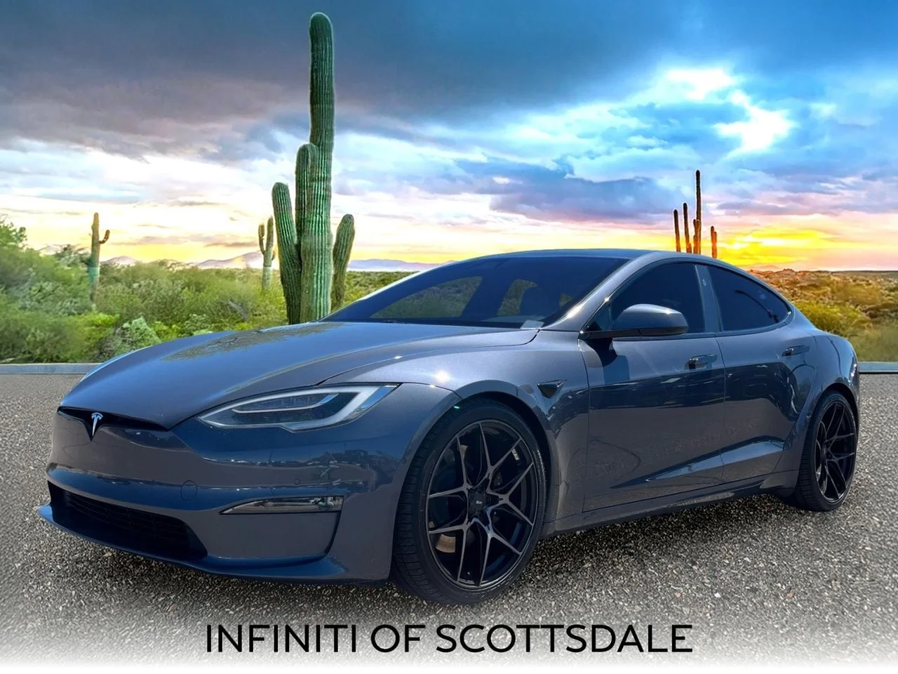 Used 2022 Midnight Silver Tesla Plaid image 1