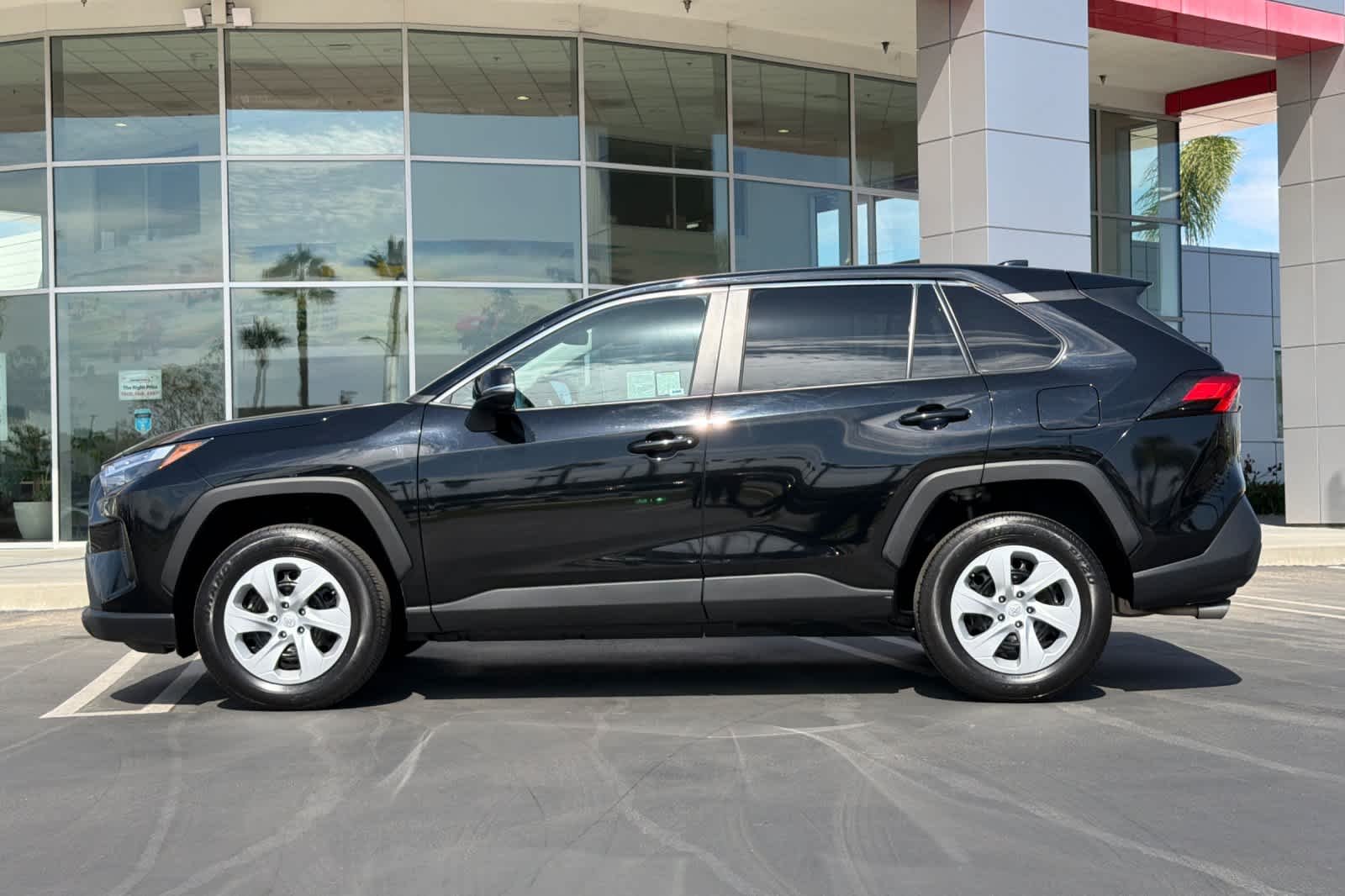 Used 2024 Midnight Black Metallic Toyota LE image 7