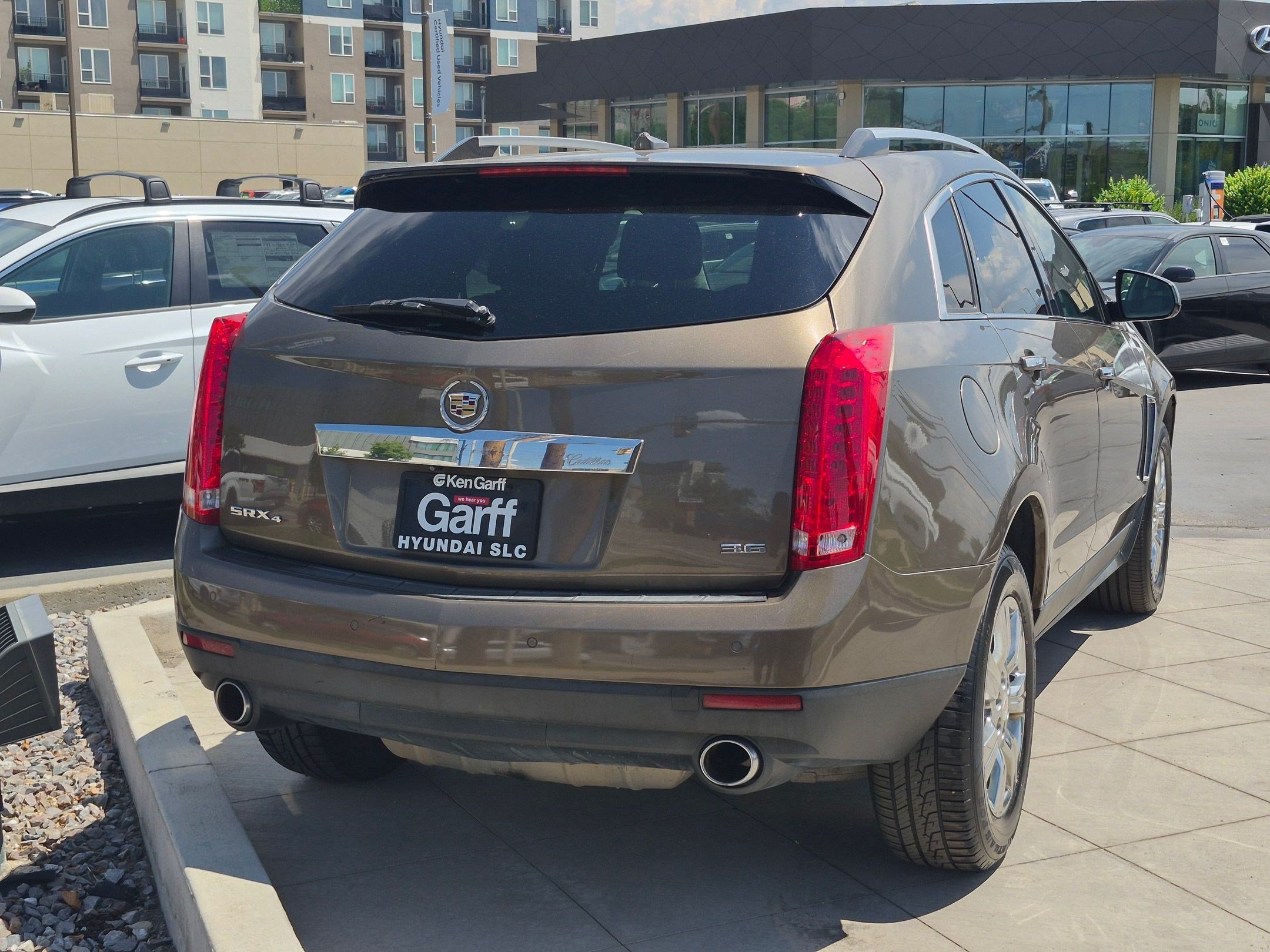 Used 2014 Terra Mocha Metallic Cadillac Luxury Collection image 4