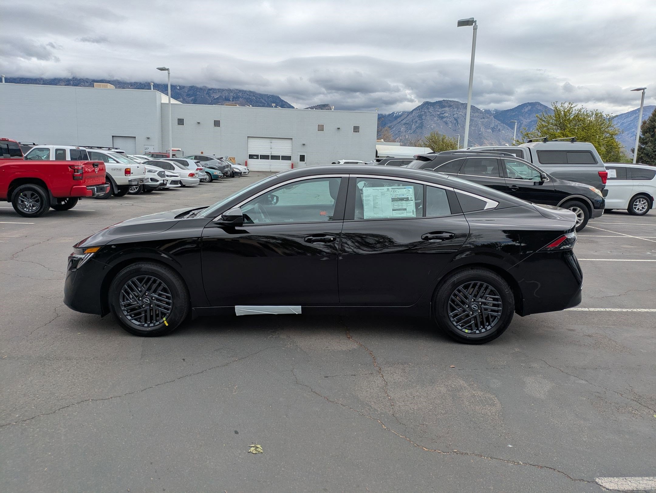New 2026 Super Black Nissan SV image 7