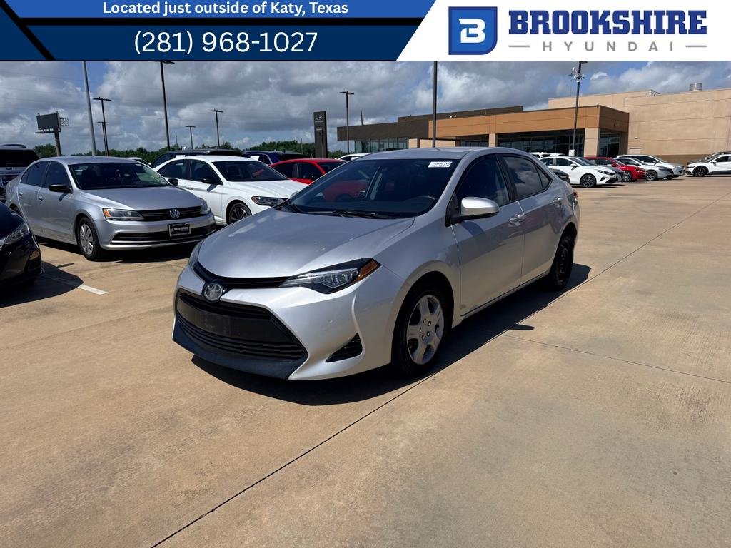 Used 2018 Classic Silver Metallic Toyota LE image 1
