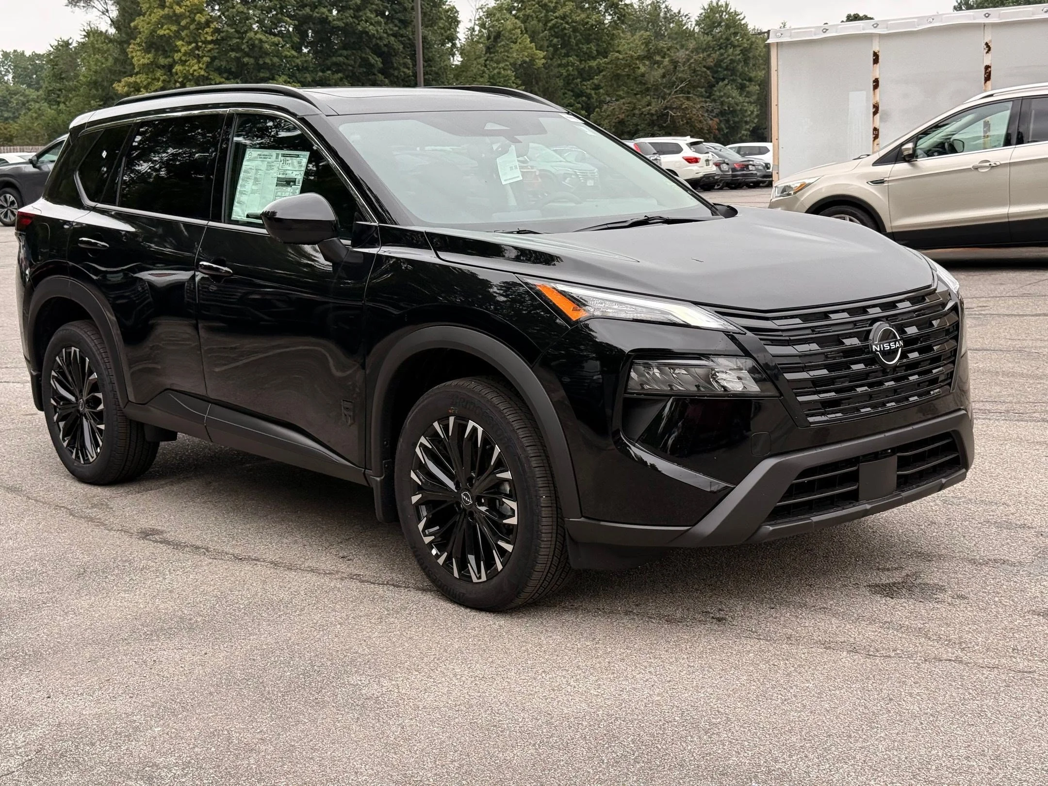 New 2026 Super Black Nissan Dark Armor image 6