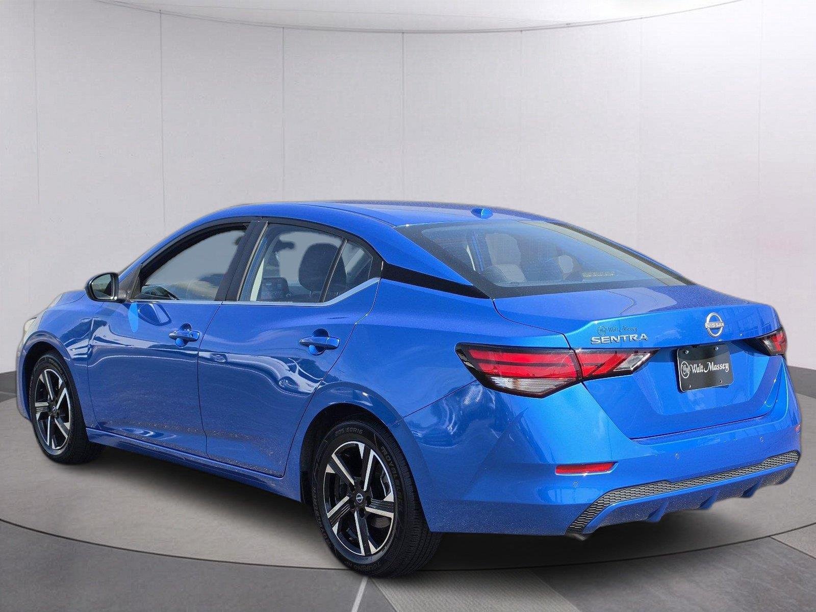 Used 2025 Electric Blue Metallic Nissan SV image 3