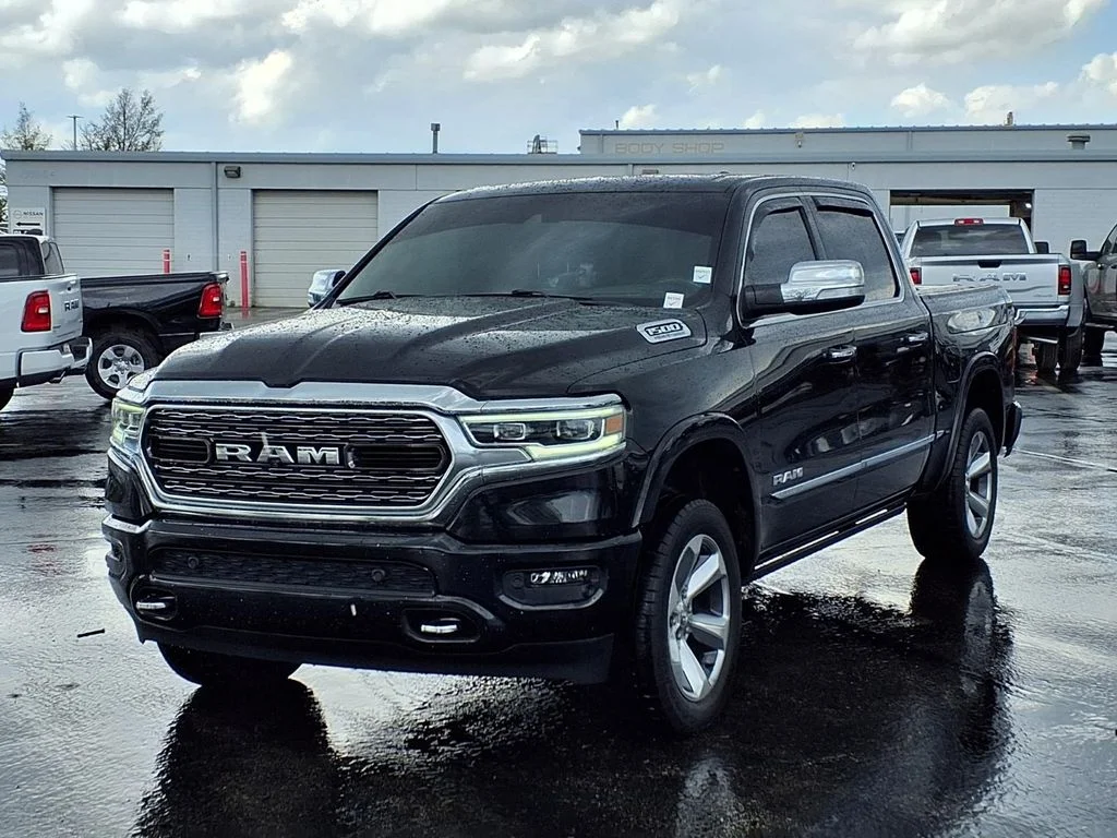 Used 2021 RAM Ram 1500 Pickup Limited with VIN 1C6SRFHT7MN602233 for sale in Kansas City