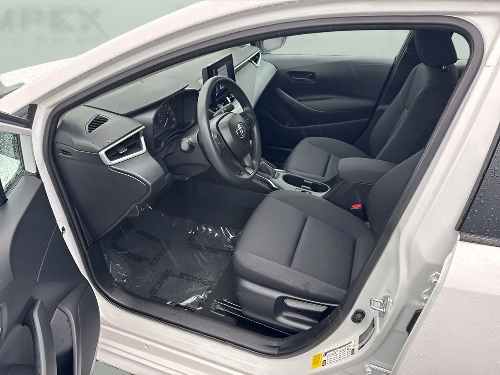 Used 2025 White Toyota LE image 9
