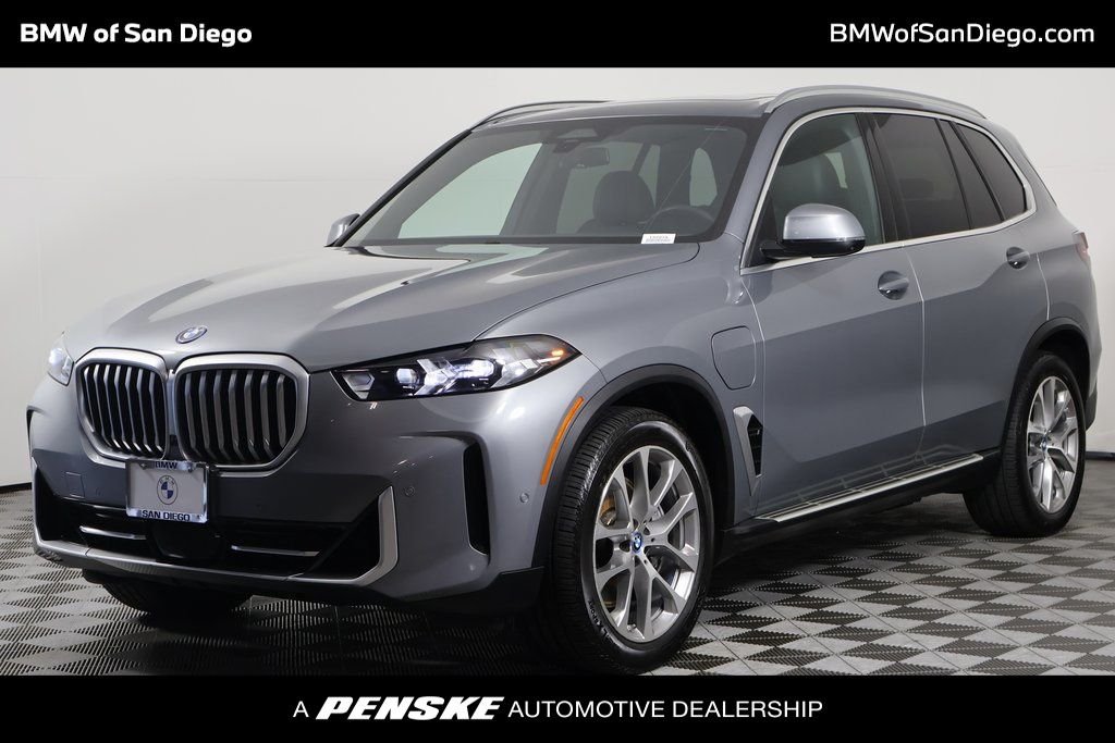 Certified Used 2024 Gray Metallic BMW xDrive50e image 1