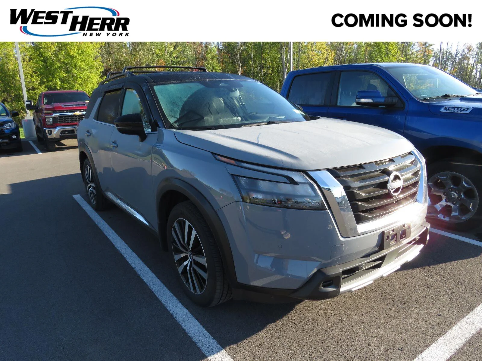 Used 2025 Solid Gray/Super Black Nissan Platinum image 1