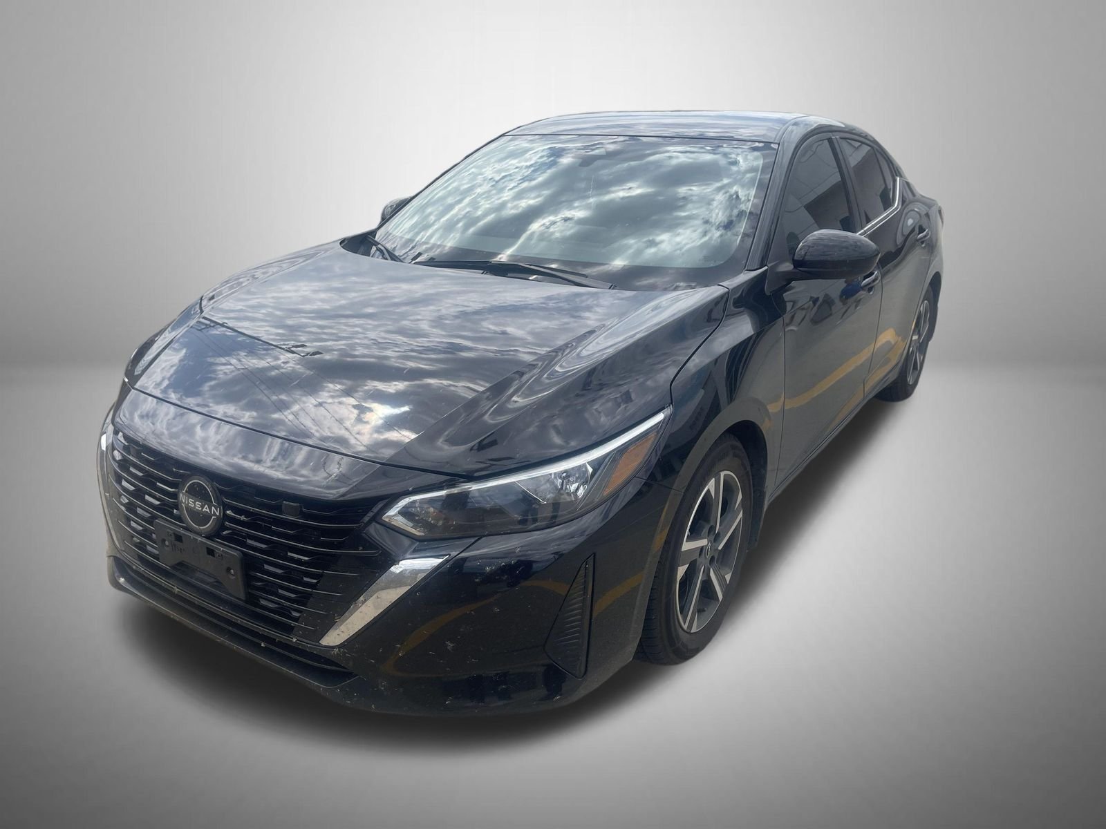 Used 2024 Black Nissan SV image 1