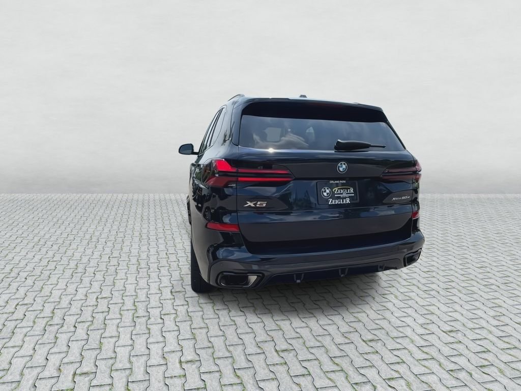 New 2026 Carbon Black Metallic BMW xDrive50e image 7