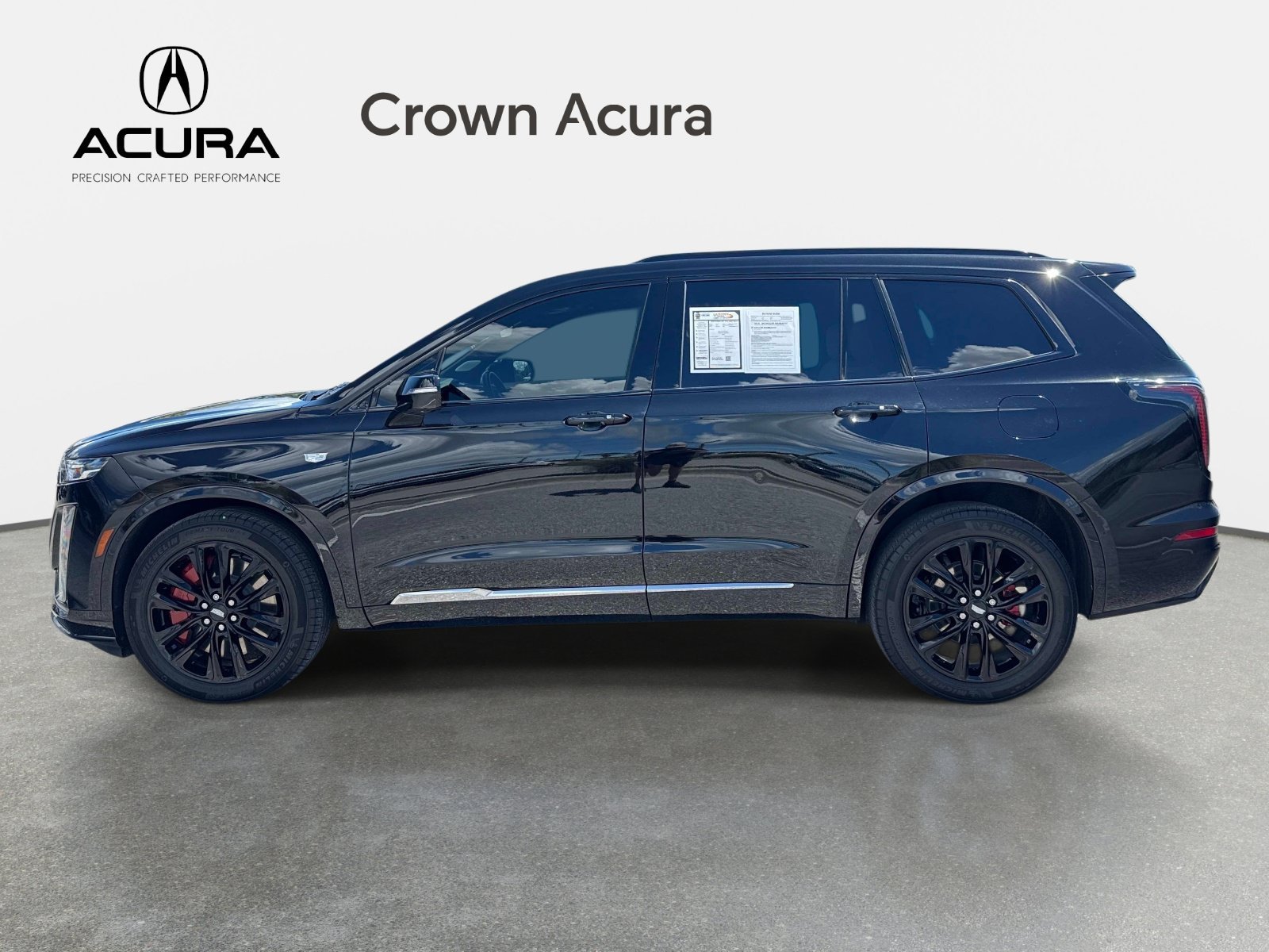 Used 2024 Stellar Black Metallic CADILLAC AWD Sport image 2
