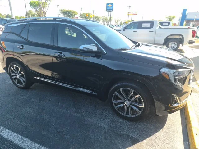 Used 2019 EBONY TWILIGHT METALLIC GMC Denali image 1