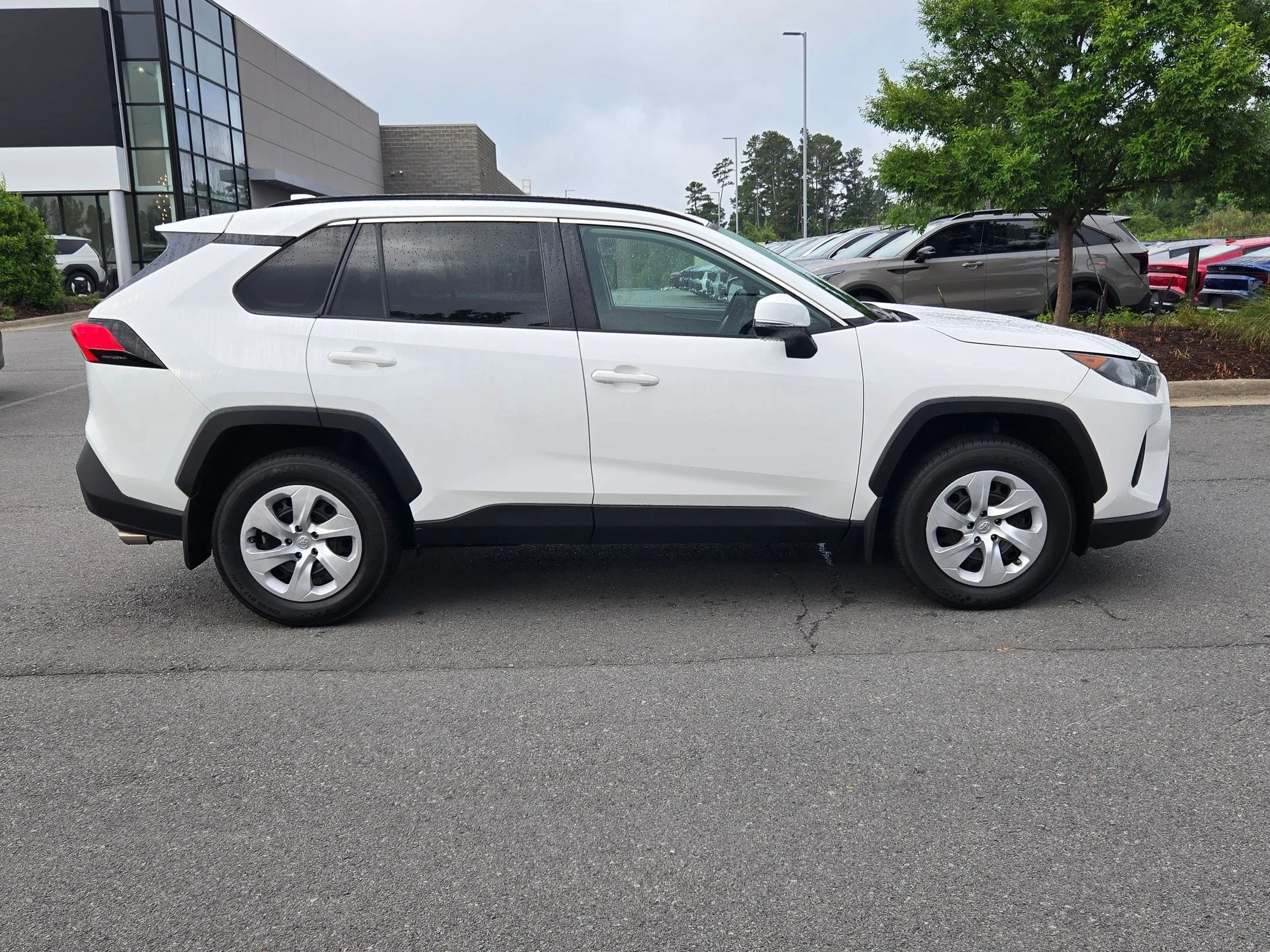 Used 2021 Super White Toyota LE image 10