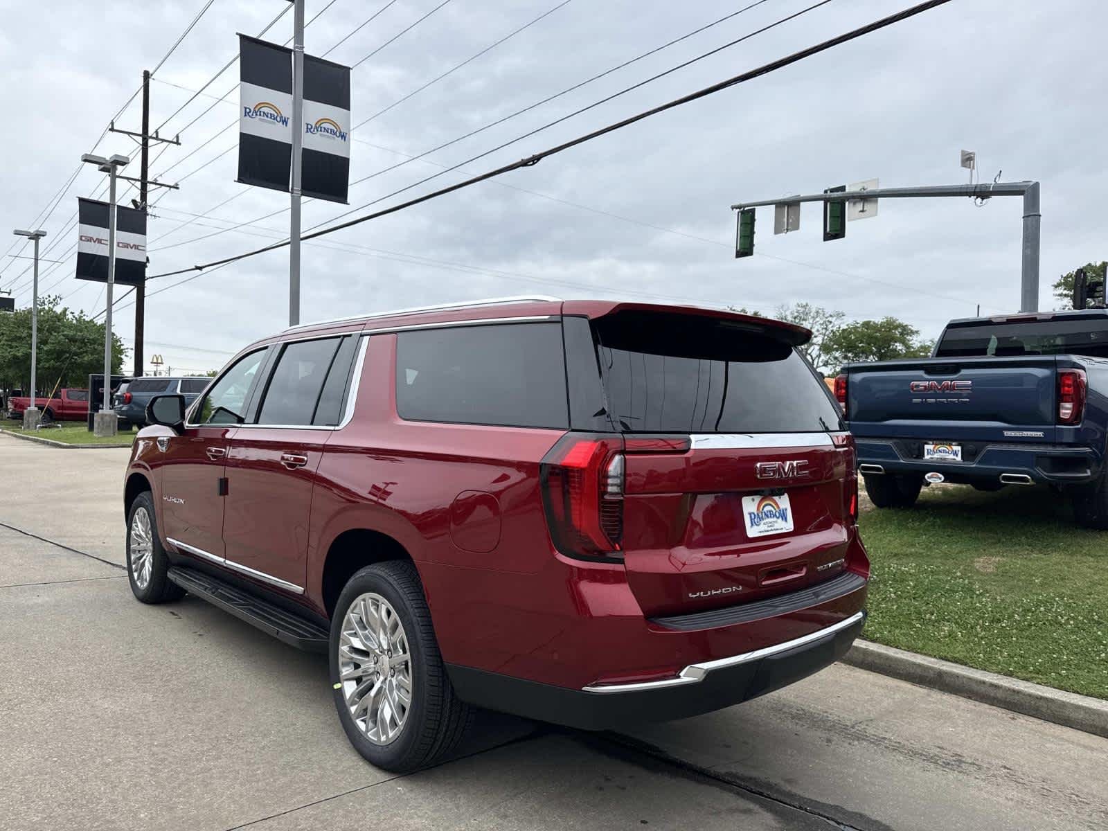 New 2026 Volcanic Red Tintcoat GMC Elevation image 5