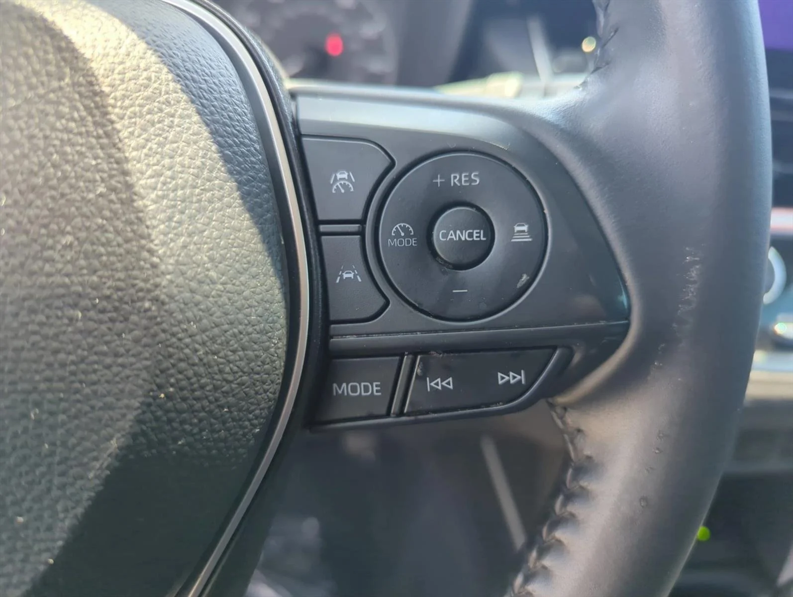 Used 2024 Blue Crush Metallic Toyota LE image 13