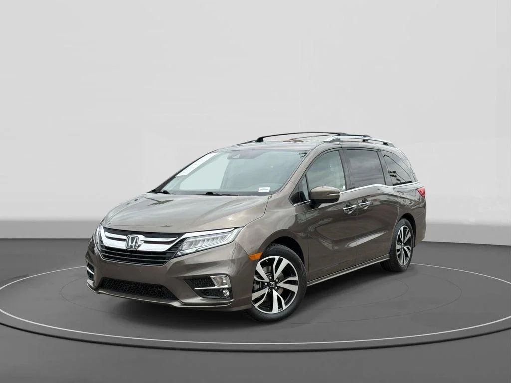 Used 2019 Pacific Pewter Metallic Honda Elite image 1