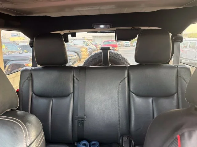 Used 2015 Red Jeep Unlimited Sahara image 13