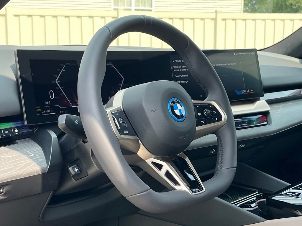 Used 2026 Mineral White Metallic BMW 550e xDrive image 19