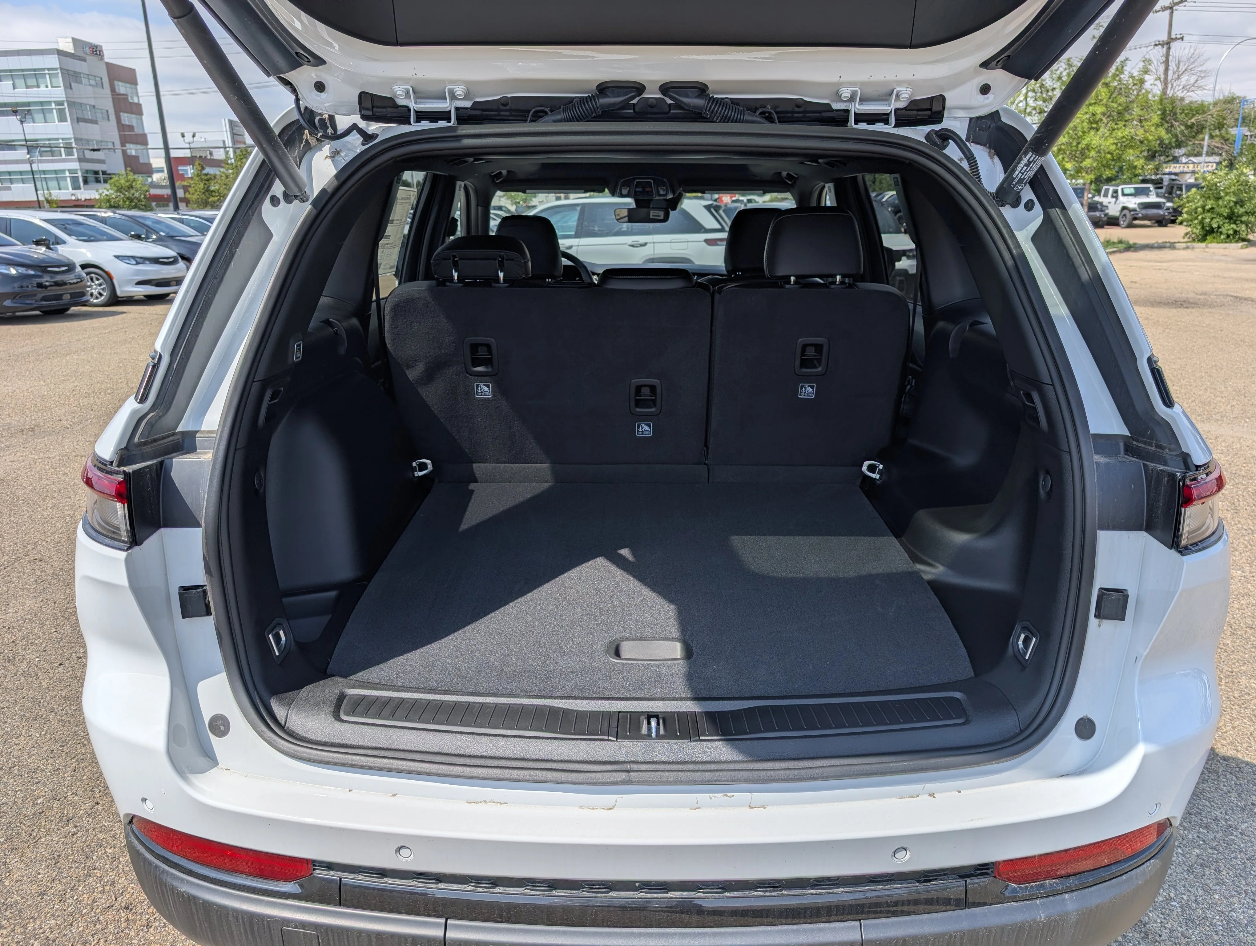 New 2025 Bright White Jeep Altitude image 6