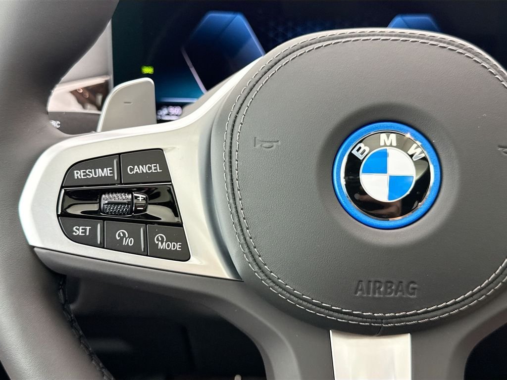 New 2026 Black Sapphire Metallic BMW xDrive50e image 11