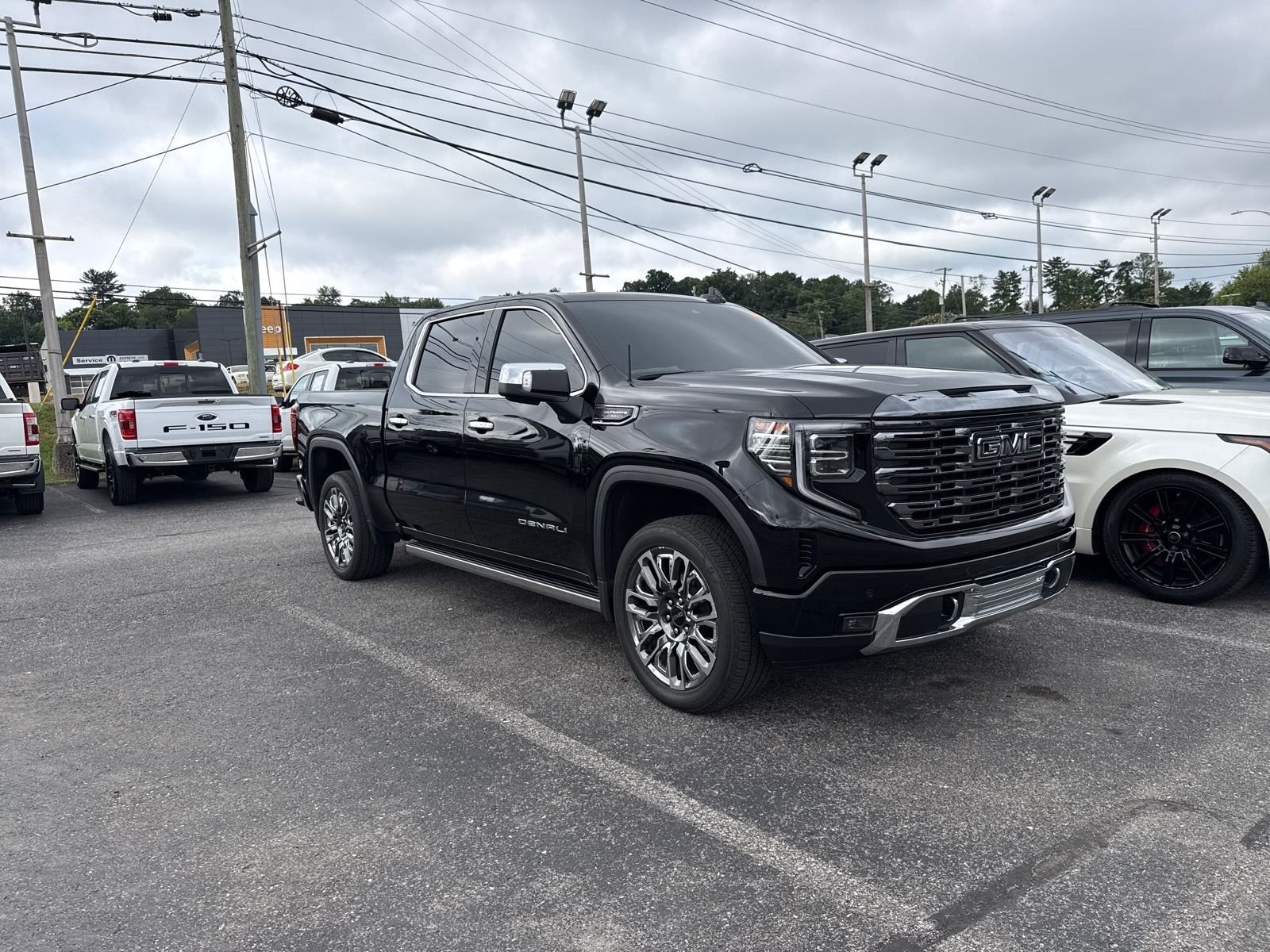 Used 2024 Black GMC Denali Ultimate image 7