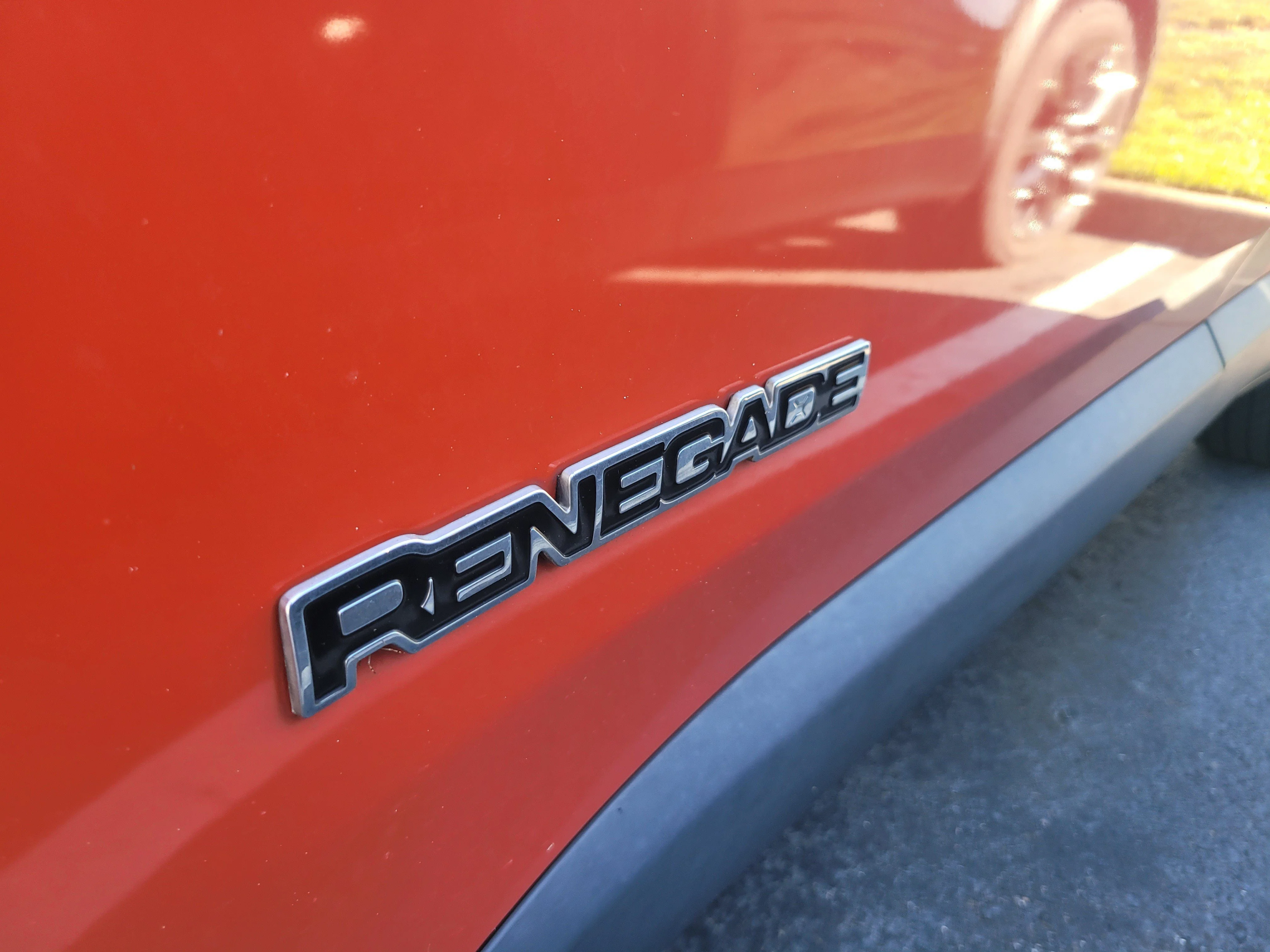Used 2016 Omaha Orange Jeep Sport image 9