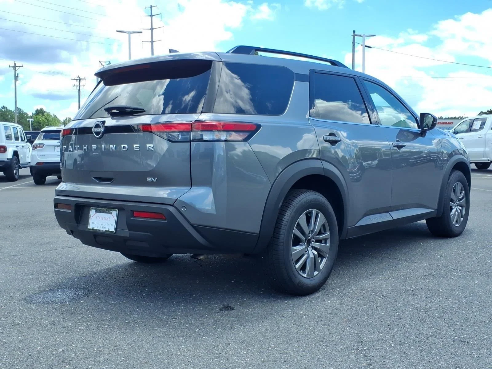Used 2024 Gun Metallic Nissan SV image 2