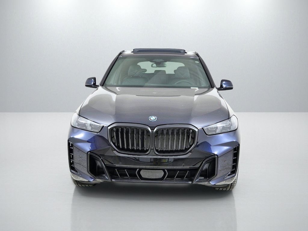 Used 2026 Carbon Black Metallic BMW xDrive50e image 3