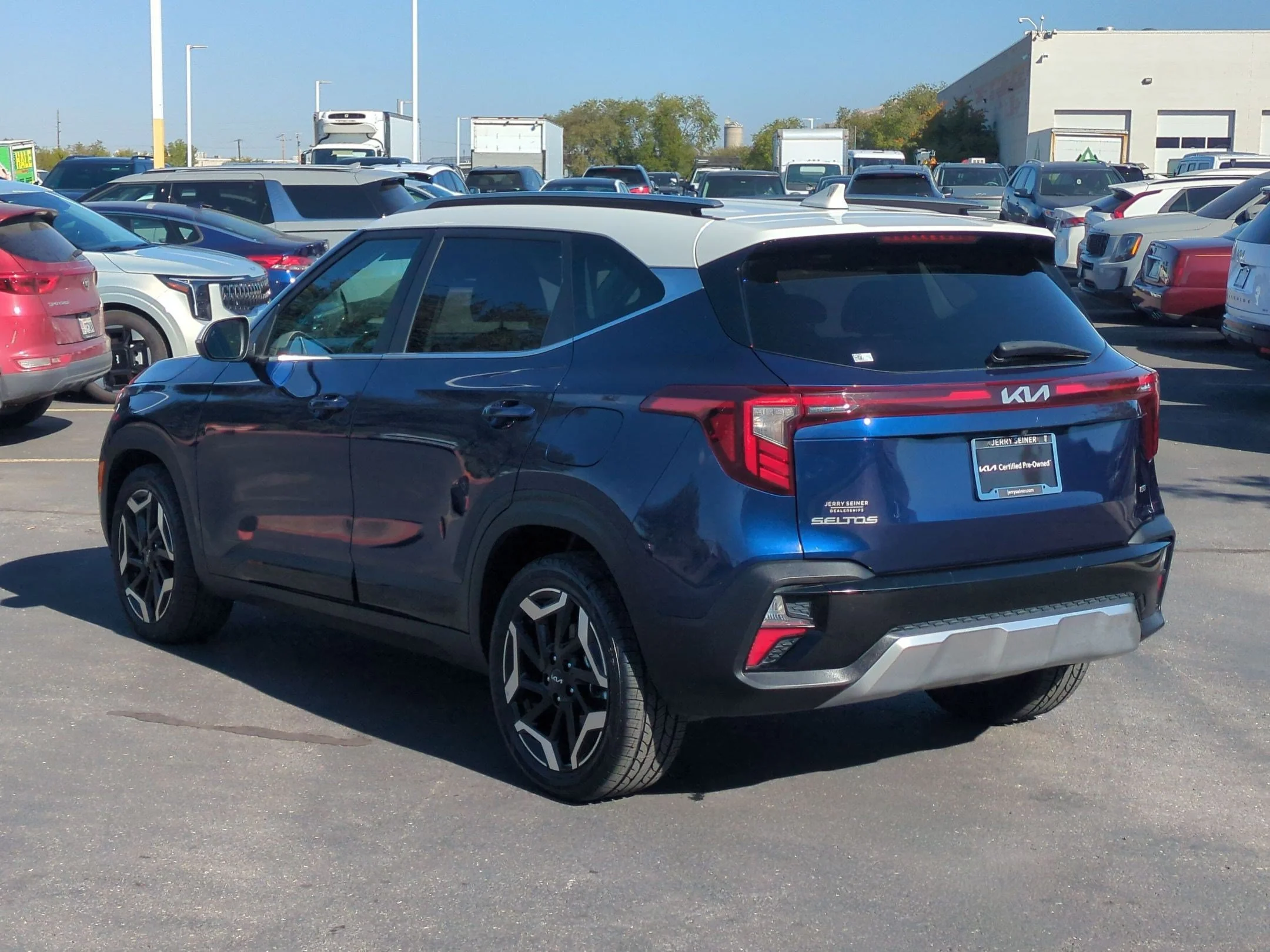 Used 2024 Dark Ocean Blue/White Roof Kia SX image 3