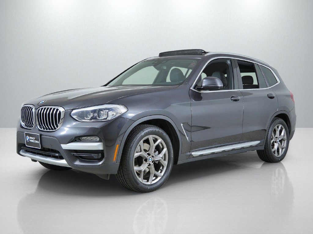 Used 2021 Dark Graphite Metallic BMW xDrive30i image 1