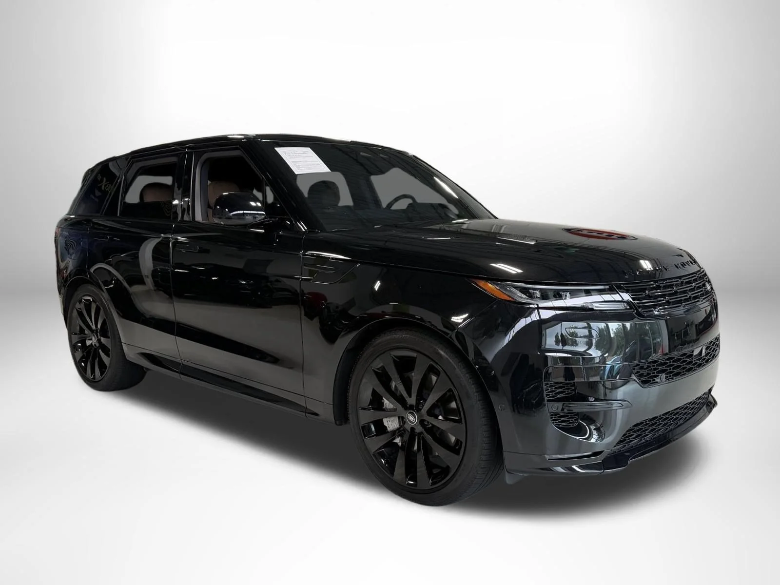 Used 2025 Santorini Black Metallic Land Rover Dynamic SE image 1