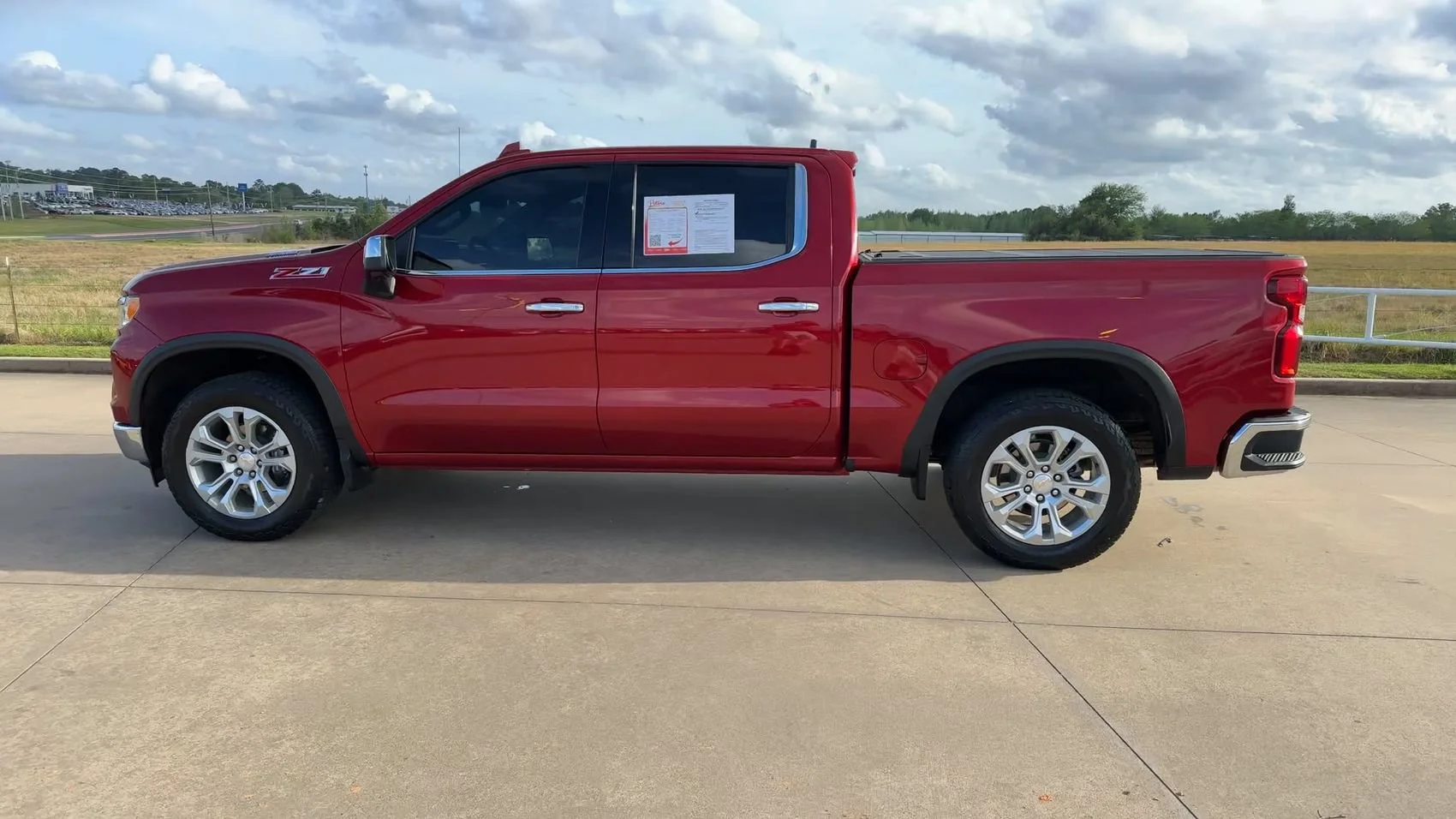 Used 2025 Radiant Red Tintcoat Chevrolet LTZ image 6