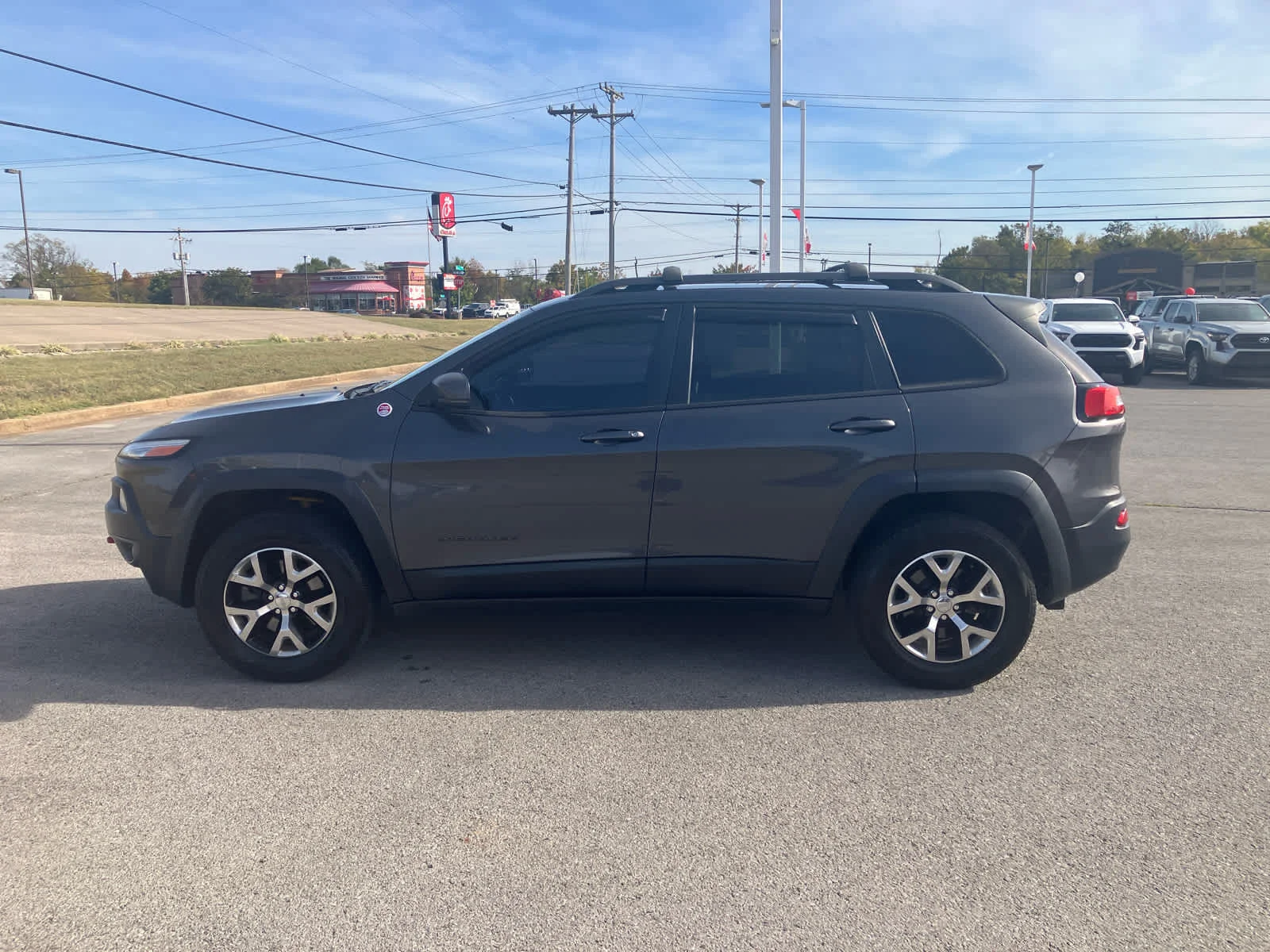 Used 2015 Granite Crystal Metallic Clearcoat Jeep Trailhawk image 4