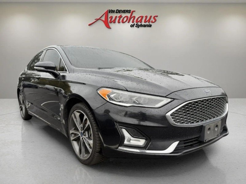 Used 2020 BLACK Ford Titanium image 1