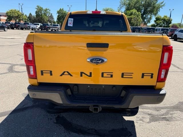 Used 2022 Orange Ford Lariat Tremor image 9