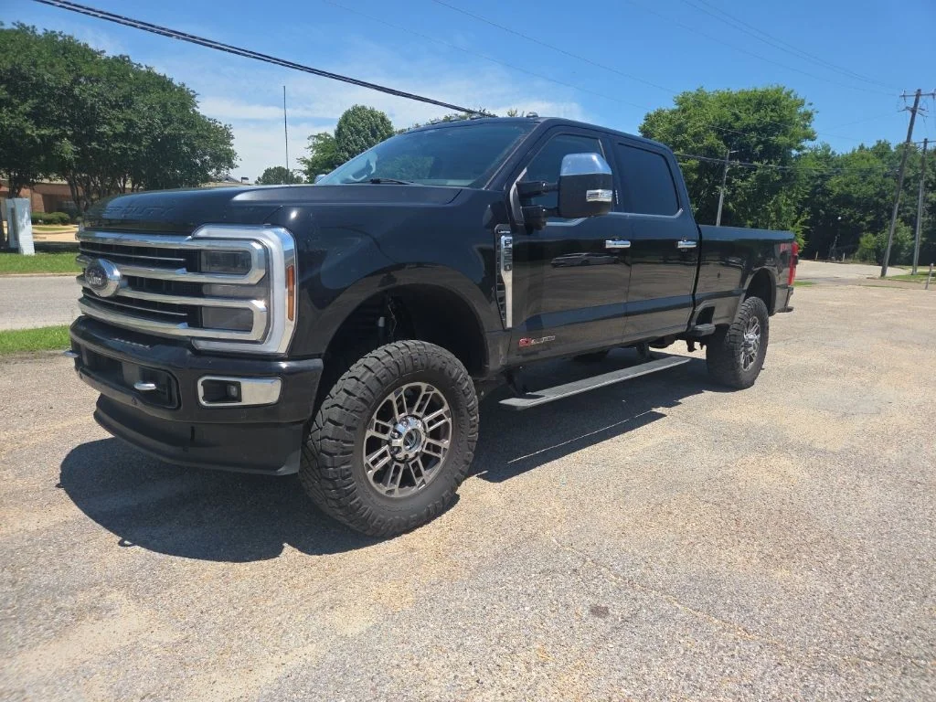 Used 2024 Black Metallic Ford Limited image 2