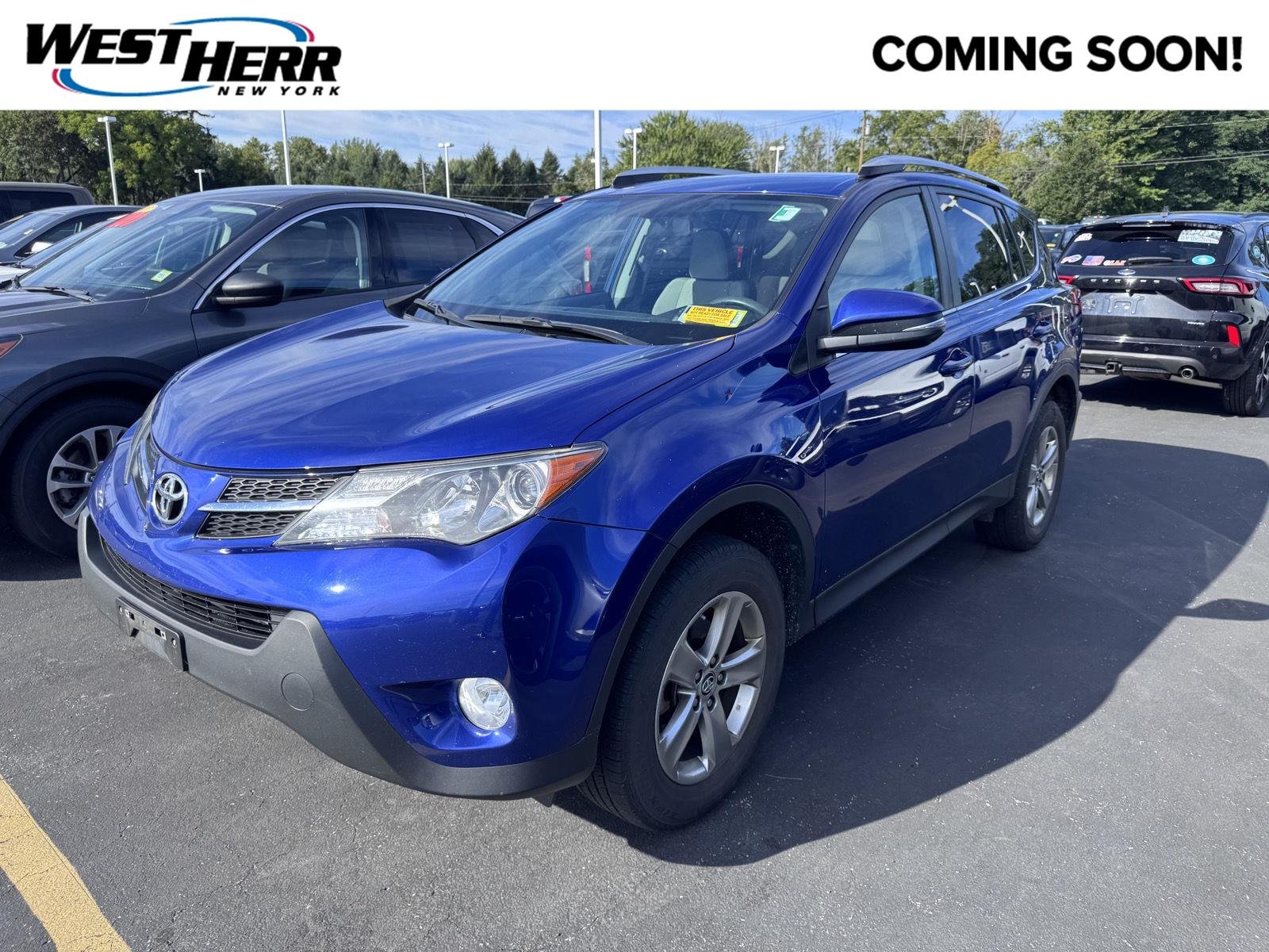 Used 2015 Blue Crush Metallic Toyota XLE image 1