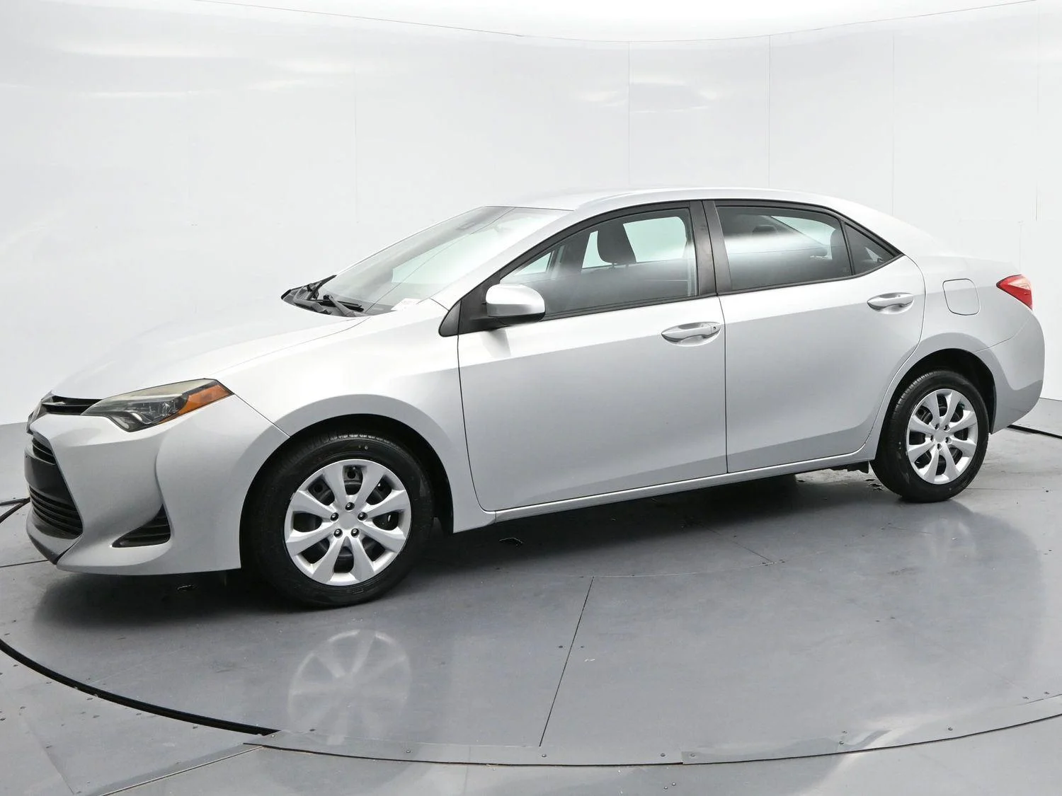 Used 2019 Classic Silver Metallic Toyota LE image 4