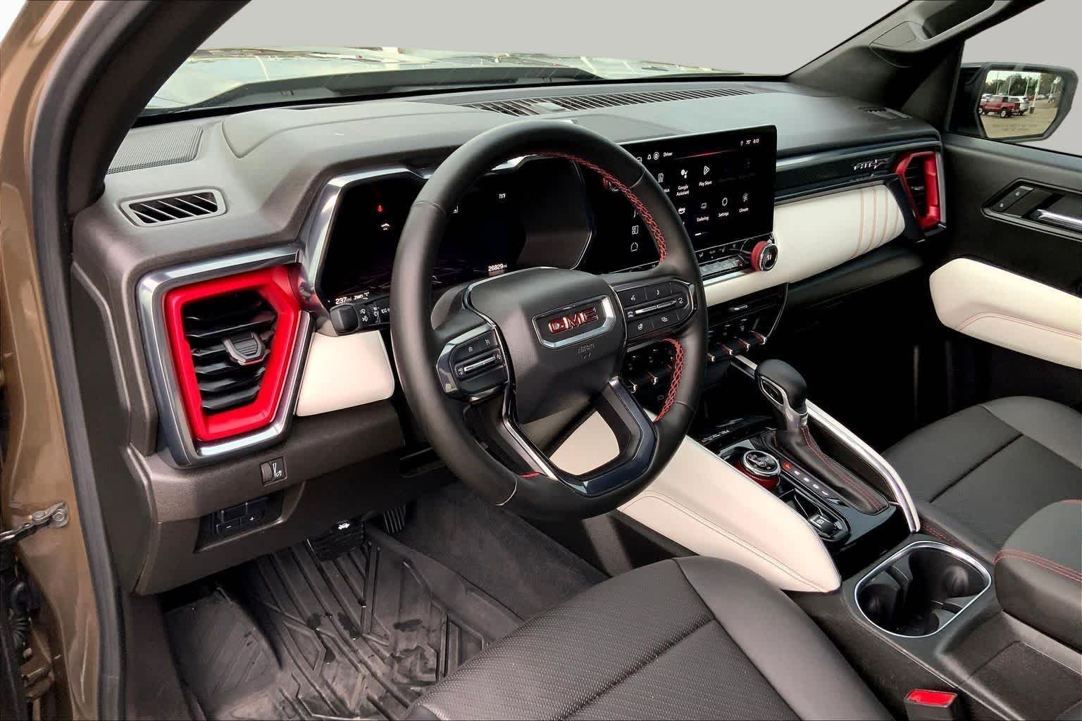 Used 2024 Deep Bronze Metallic GMC 4WD AT4X image 18