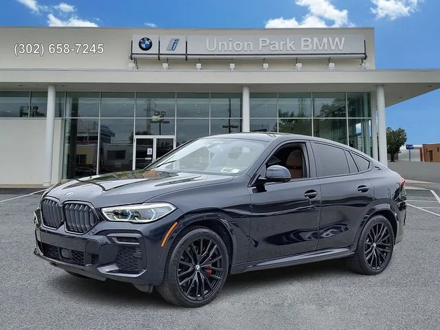 Used 2022 Carbon Black Metallic BMW M50i image 1