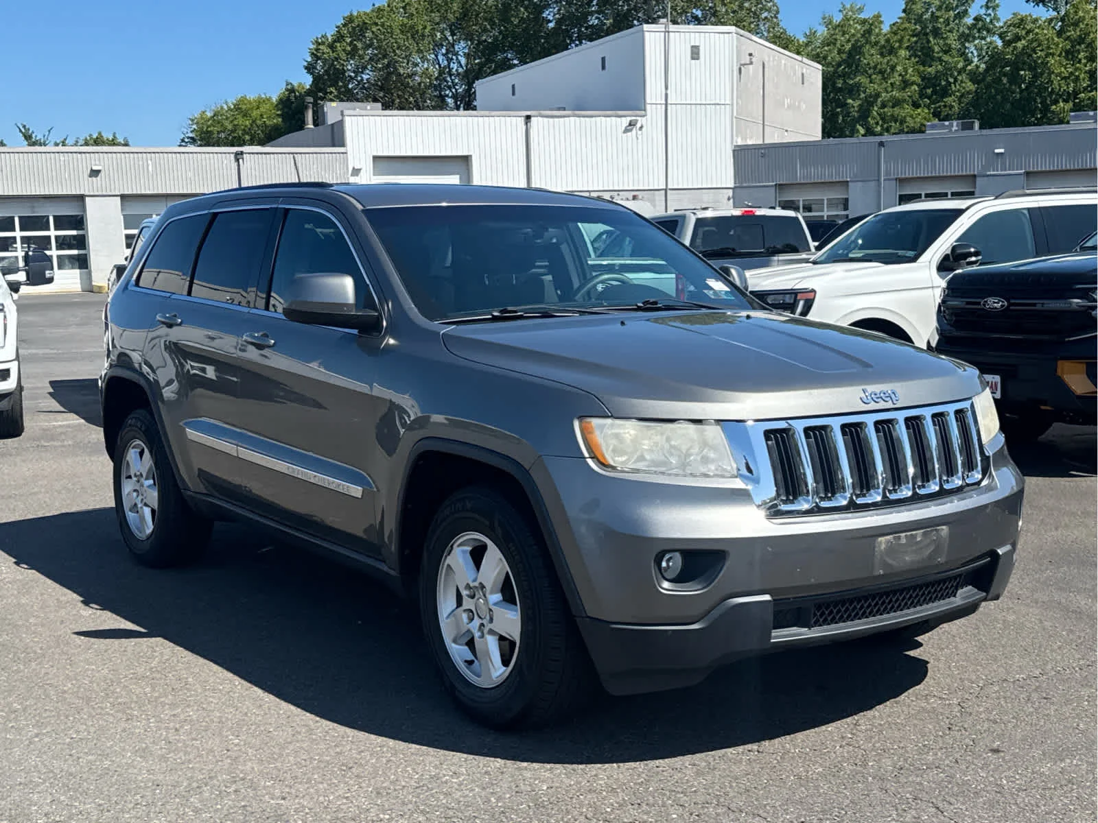 Used 2012 Mineral Gray Metallic Jeep Laredo image 6