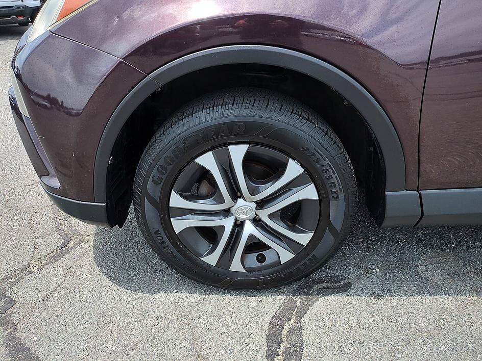 Used 2016 Black Currant Metallic Toyota LE image 10