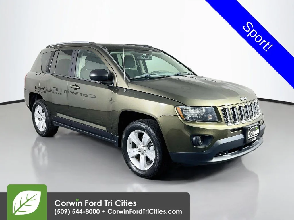 Used 2016 Green Jeep Sport image 1