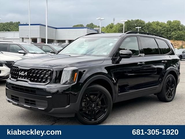 Used 2024 Black Kia EX X-Line image 2