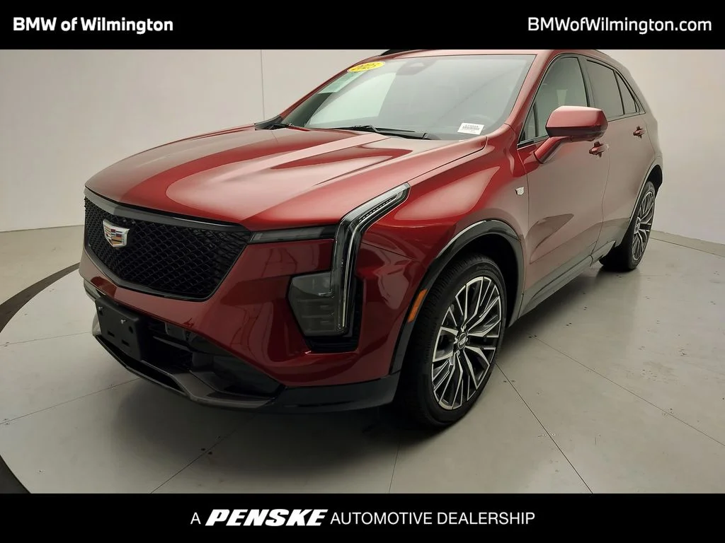 Used 2025 Red Cadillac Sport image 1