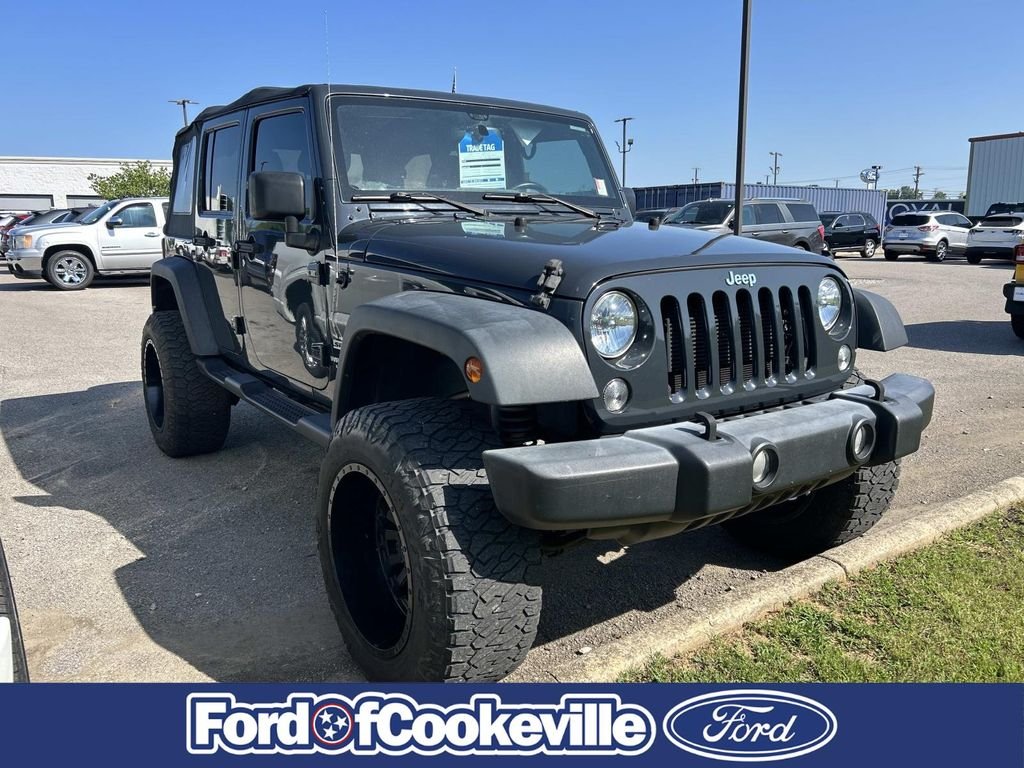 Used 2017 Rhino Clearcoat Jeep Unlimited Sport image 1